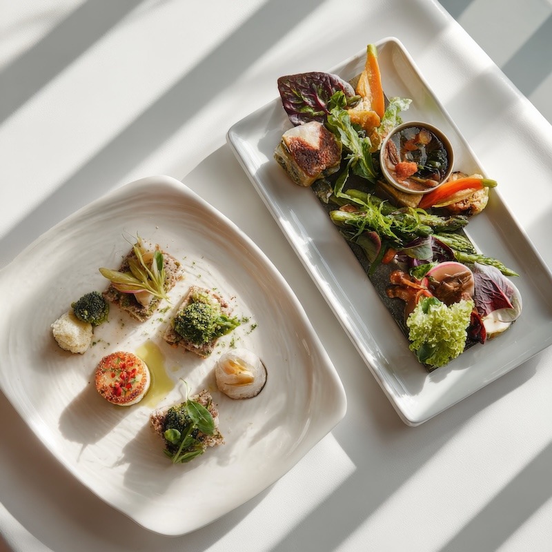 An a la carte meal on the left and a prix fix meal on the right