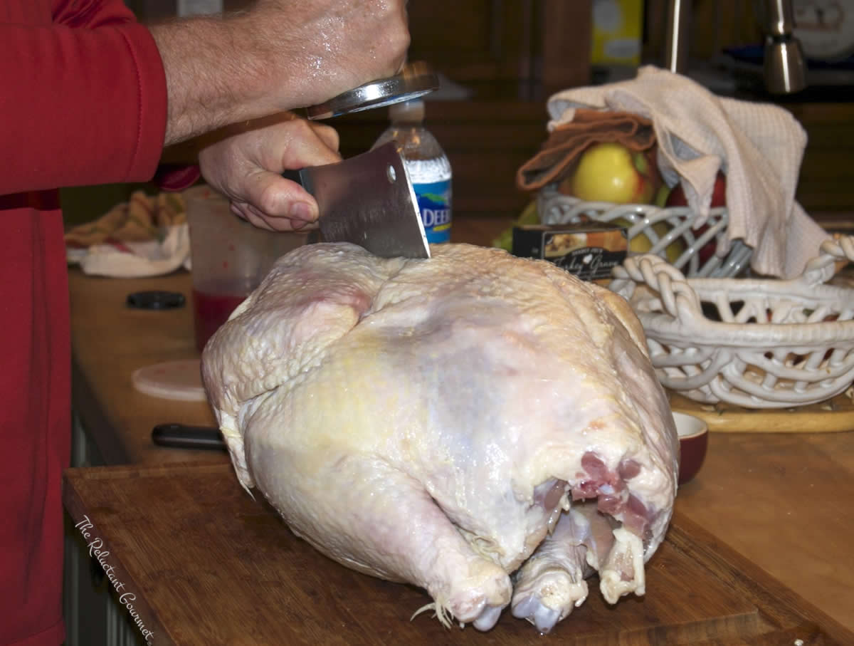 Removing Turkey Backbone with Cleaver