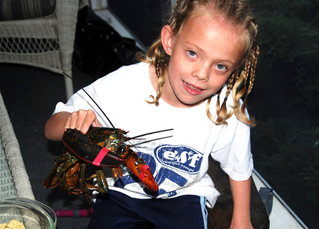 daughter with live lobster