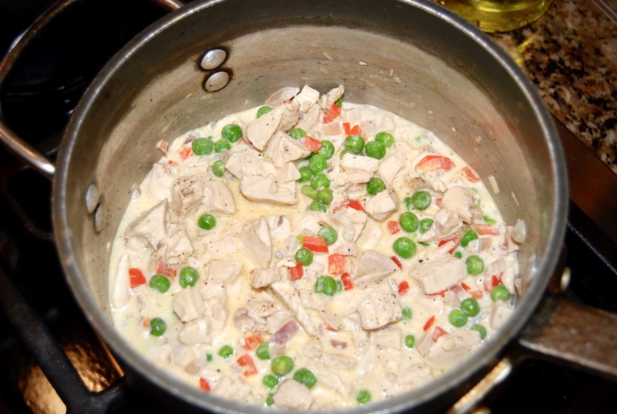 Chicken and Peas in Cream Sauce in Pot