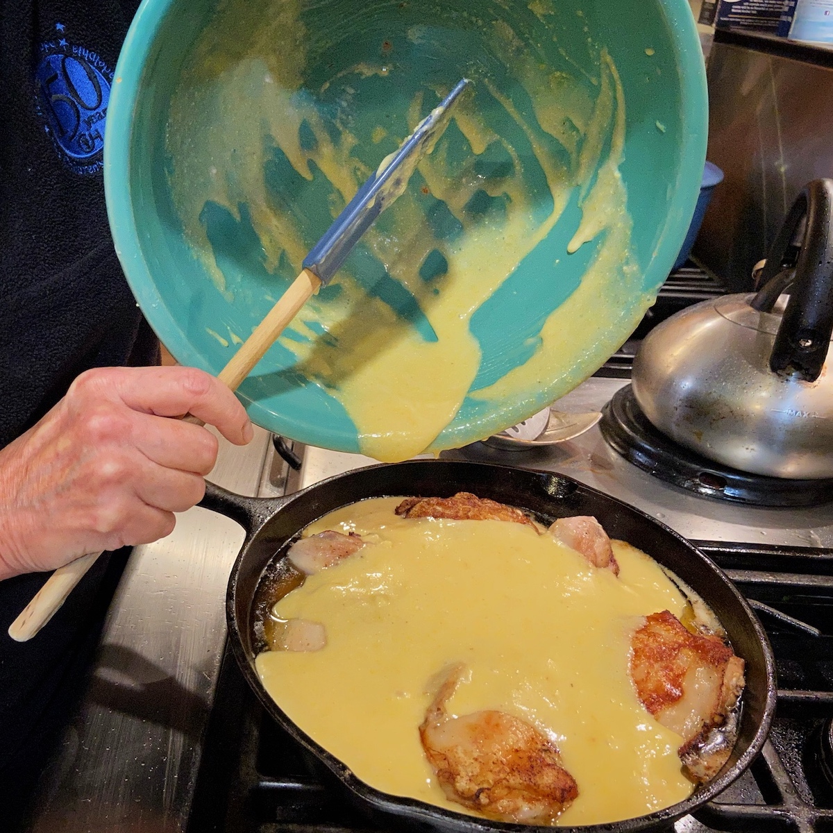 Adding Cornbread Batter to Pan