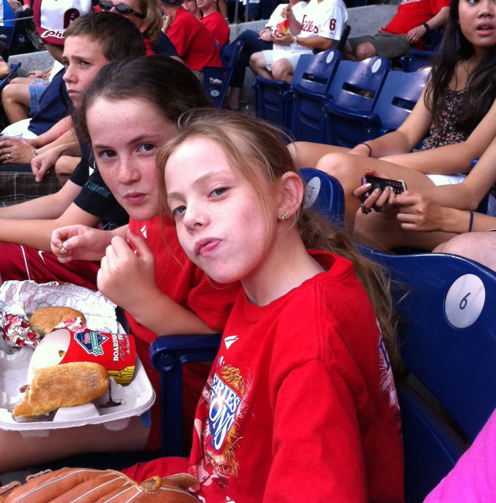 Maddie at a Phillies Game with Cheesesteaks