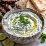 Mediterranean tzatziki sauce in a rustic ceramic bowl