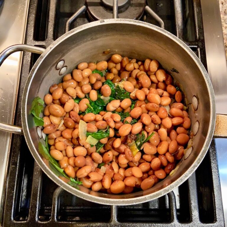 Cranberry beans added to the soup pot