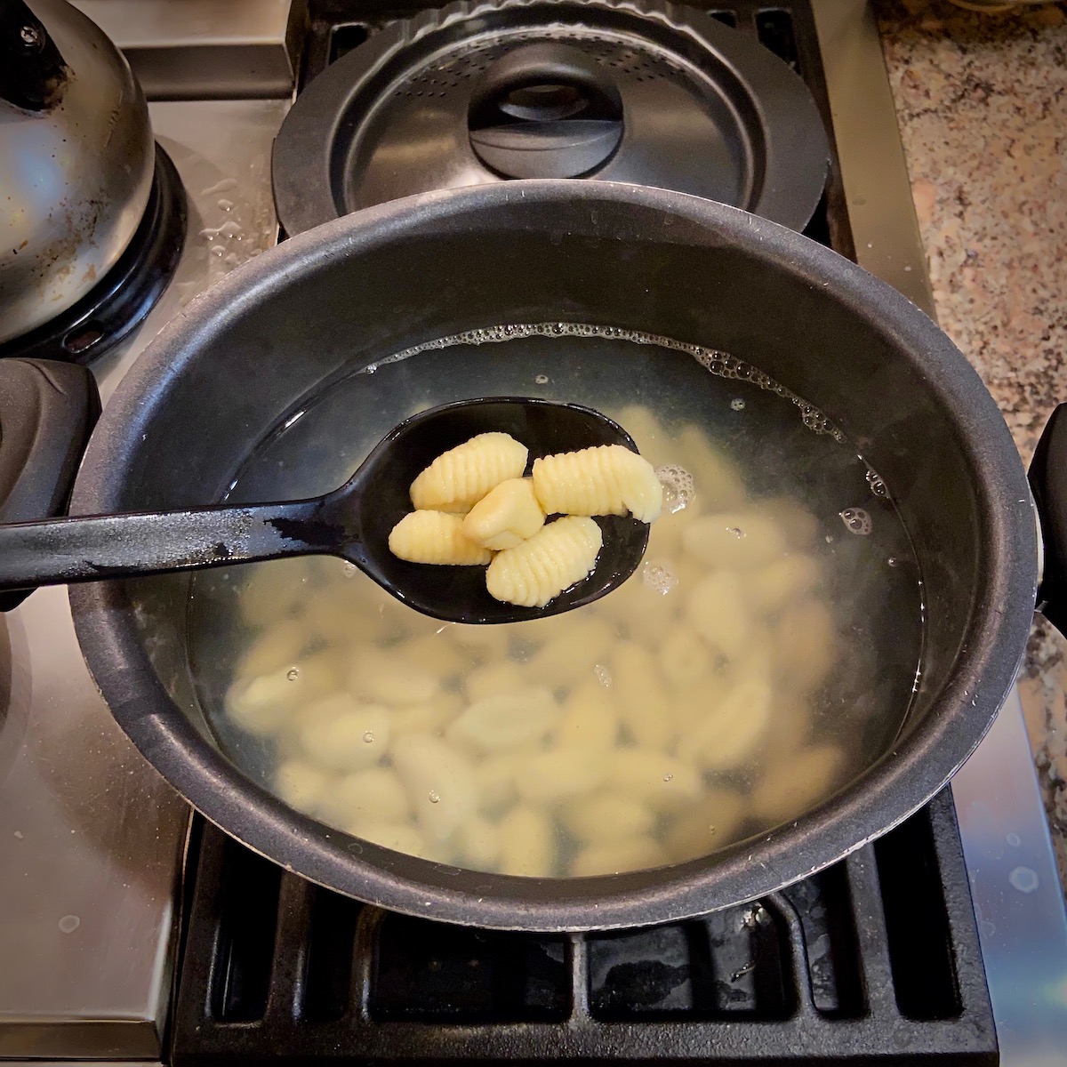 Gnocchi Cooking in Pot of Water