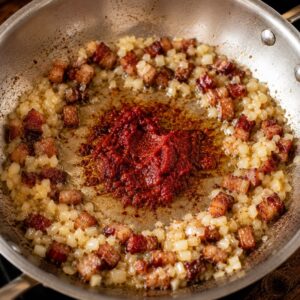 guanciale with onions and tomato paste