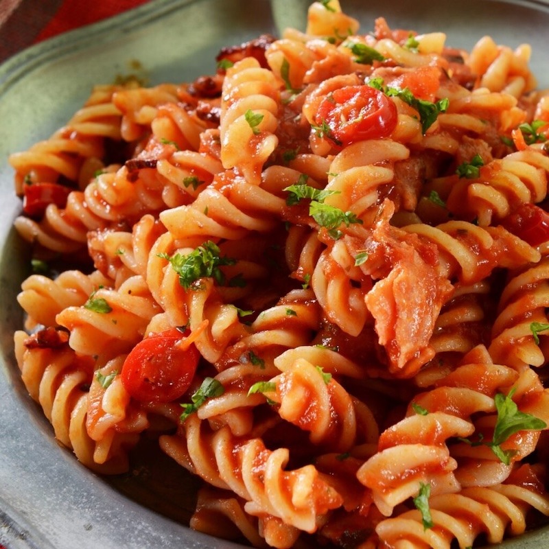 A bowl of fusilli Mediterranean style.