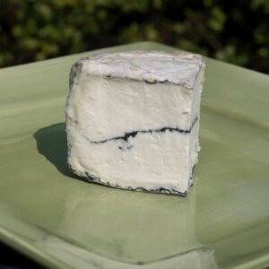 Humboldt Fog Cheese on a plate