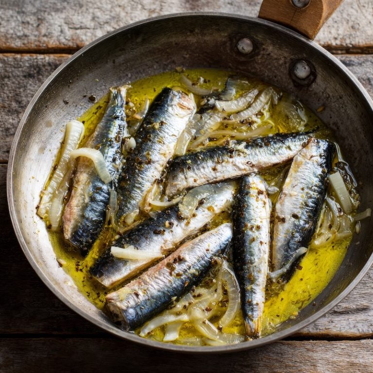 Anchovies Cooking in Olive Oil