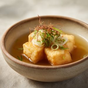 A bowl of perfectly cooked, deep fried agedashi tofu