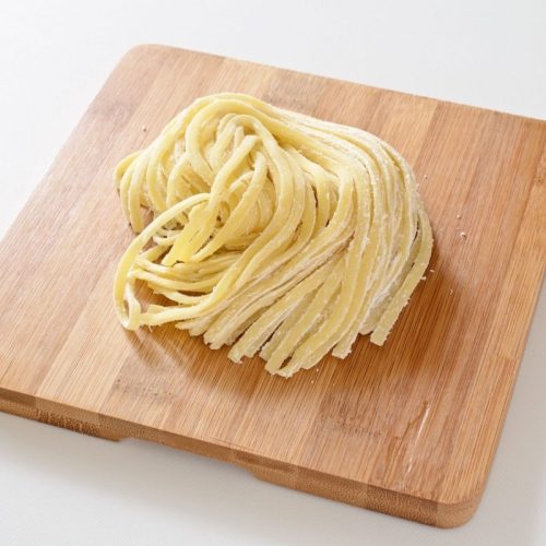 Fresh Pasta on a Wooden Cutting Board